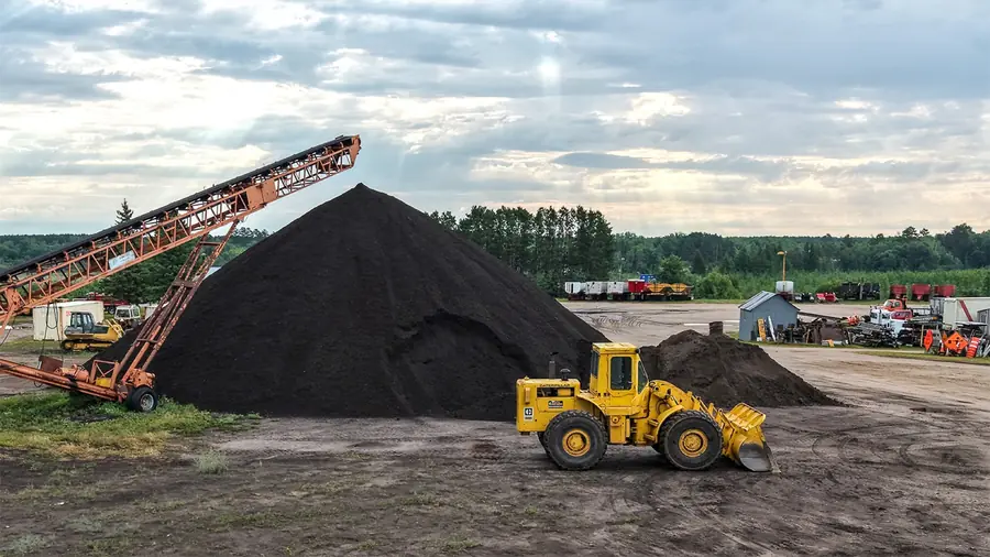 Storlie Construction loader moving material
